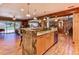 Open concept kitchen with marble countertops and stainless steel dishwasher at 910 N Kepler Rd, Deland, FL 32724