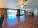 Spacious, open living room with hardwood floors and backyard views at 910 N Kepler Rd, Deland, FL 32724