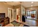 Living room with access to a bathroom and the sunroom at 910 N Kepler Rd, Deland, FL 32724