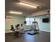 A well-equipped fitness center with various exercise machines and a wall-mounted TV at 935 S Atlantic Ave # 364, Daytona Beach, FL 32118