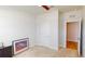 Bedroom with a ceiling fan and an open door at 1002 Chelan Falls Dr, Deland, FL 32724