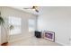 A bedroom with a ceiling fan and window views at 1002 Chelan Falls Dr, Deland, FL 32724