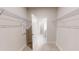 Open door reveals a closet with shelves at 1002 Chelan Falls Dr, Deland, FL 32724