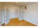 Bright office with hardwood floors, natural light, and neutral walls features french doors at 1002 Chelan Falls Dr, Deland, FL 32724