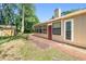 The backyard features a brick patio with ample space for outdoor seating and entertainment at 101 Sweetwater Oaks Ln, Daytona Beach, FL 32114