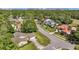 This aerial view showcases a well-planned neighborhood surrounded by lush trees, offering a serene living environment at 101 Sweetwater Oaks Ln, Daytona Beach, FL 32114