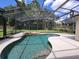Enjoy this beautiful screened in pool with a waterfall feature and a large deck perfect for entertaining at 1072 Ceasars Ct, Mount Dora, FL 32757