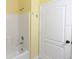 Well-lit bathroom featuring a bathtub and shower at 112 Coral Reef Ct, Sanford, FL 32771