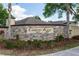 Attractive stone community sign for Celery Key, set amidst lush landscaping and manicured grounds at 112 Coral Reef Ct, Sanford, FL 32771