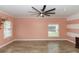 Bright and airy living room with modern fan and ample natural light at 112 Coral Reef Ct, Sanford, FL 32771