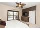 Main bedroom with a ceiling fan and neutral colors, offering a relaxing and serene space at 112 Coral Reef Ct, Sanford, FL 32771