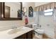 Bathroom featuring a shower-tub combination, and a single sink vanity at 1128 Heidi Ct, Deland, FL 32720