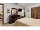 Bedroom featuring a bed, dresser with mirror, and closet with louvered doors at 1128 Heidi Ct, Deland, FL 32720
