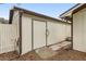 Storage shed exterior with access door at 1128 Heidi Ct, Deland, FL 32720