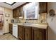 Functional kitchen with classic cabinetry and abundant countertop space at 1128 Heidi Ct, Deland, FL 32720