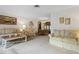 Spacious living room connected to dining area, filled with natural light at 1128 Heidi Ct, Deland, FL 32720