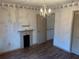 The dining room has laminate wood floors and unique wall decor adding style at 1179 Heidi Ct, Deland, FL 32720