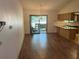 The dining area includes hardwood floors and direct access to the enclosed lanai at 1179 Heidi Ct, Deland, FL 32720