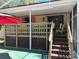 A great porch on this home offers a great shaded area for relaxing outdoors at 1179 Heidi Ct, Deland, FL 32720