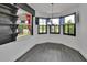 Breakfast nook with shuttered windows offering scenic outdoor views and a chandelier at 1188 Eggleston Dr, Deland, FL 32724
