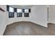 Bright dining room with shuttered windows, wood-look floors, and custom trim at 1188 Eggleston Dr, Deland, FL 32724