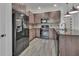 Well-equipped kitchen features granite countertops, stainless appliances, and ample cabinet space at 1188 Eggleston Dr, Deland, FL 32724