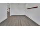 Spacious living room with wood-look flooring and a light and airy atmosphere at 1188 Eggleston Dr, Deland, FL 32724
