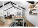 Inviting dining space with natural light, vaulted ceilings, and views into the living area at 1202 Anderson St, Deltona, FL 32725