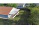 Spacious backyard with a screened-in porch and a wooden fence at 1222 Madelena Ave, Winter Springs, FL 32708
