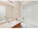 Bright bathroom featuring a marble countertop vanity and a shower and bathtub combo at 1222 Madelena Ave, Winter Springs, FL 32708