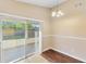 Bright dining room with sliding glass doors to a patio at 1222 Madelena Ave, Winter Springs, FL 32708