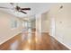 Spacious living room with hardwood floors, ceiling fan, and high vaulted ceilings at 1222 Madelena Ave, Winter Springs, FL 32708