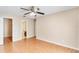 Bright main bedroom featuring hardwood floors at 1222 Madelena Ave, Winter Springs, FL 32708