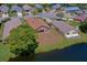 Overhead shot showcasing the property's backyard with water views and neighborhood landscape at 133 Wood Ibis Ct, Daytona Beach, FL 32119