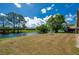 Expansive waterfront backyard offering serene views and ample space for outdoor activities at 133 Wood Ibis Ct, Daytona Beach, FL 32119