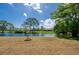 Scenic backyard with water view offers tranquil outdoor living at 133 Wood Ibis Ct, Daytona Beach, FL 32119