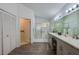 Bright bathroom features a large walk-in shower and double sink vanity at 133 Wood Ibis Ct, Daytona Beach, FL 32119