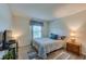Cozy bedroom offers a comfortable spot with natural light at 133 Wood Ibis Ct, Daytona Beach, FL 32119