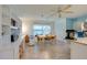 Bright and spacious kitchen with white cabinetry, stainless steel appliances, and tile flooring at 133 Wood Ibis Ct, Daytona Beach, FL 32119
