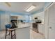 Contemporary kitchen boasting stainless steel appliances, and white cabinetry at 133 Wood Ibis Ct, Daytona Beach, FL 32119