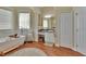 Elegant bathroom featuring a soaking tub, a granite vanity, and a round decorative rug at 1504 Ginger Snap, Deland, FL 32720