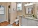 Cozy bathroom featuring granite countertops, wood floors, and a walk-in shower at 1504 Ginger Snap, Deland, FL 32720