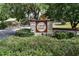 Cross Creek community sign amidst lush landscaping, creating a welcoming entrance to a peaceful neighborhood at 1504 Ginger Snap, Deland, FL 32720