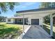 Front exterior featuring a carport and a well-manicured lawn at 1534 Center St, Deland, FL 32720