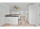 Open-concept living and kitchen area with natural light at 1534 Center St, Deland, FL 32720
