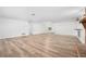 Spacious living room with neutral walls, wood flooring and lots of natural light at 1534 Center St, Deland, FL 32720