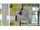 Aerial view of the home showing the layout of the pool, gardens and yard at 1613 Lady Fern Trl, Deland, FL 32720