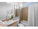 Well-lit bathroom featuring a vanity, sink, and a shower-tub combination at 1613 Lady Fern Trl, Deland, FL 32720