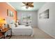 Inviting bedroom featuring natural light, soft textures, and contemporary decor for relaxation at 1613 Lady Fern Trl, Deland, FL 32720