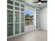Spacious bedroom features custom built-in shelving and a large window at 1613 Lady Fern Trl, Deland, FL 32720